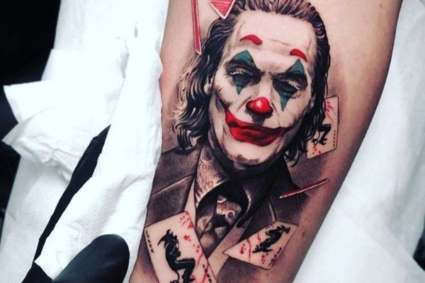 tattoo of a half face batman and half face joker  Stable Diffusion   OpenArt